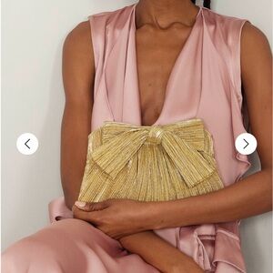 LOEFFLER RANDALL
Rayne bow-embellished plissé-lamé clutch